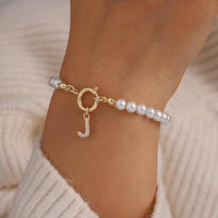 Bracelet en Or avec Perles et Lettre