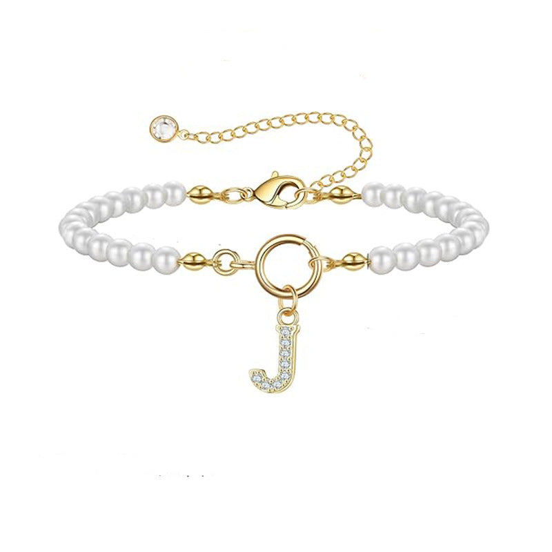Bracelet en Or avec Perles et Lettre
