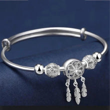 Bracelet ajustable avec pendentifs en forme de trois feuilles en argent