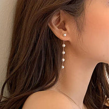 Boucles d'oreilles avec pendentifs en perles