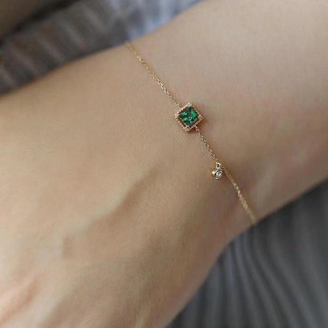 Bracelet en or avec cristal vert