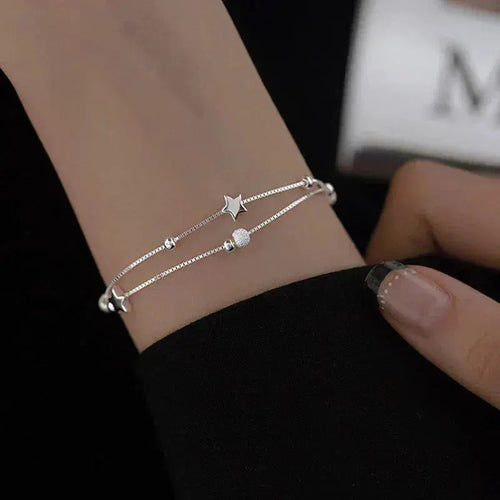 Bracelet en argent avec étoiles