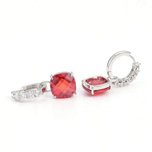 Boucles d'oreilles en rubis et diamant