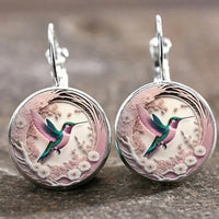 Collier avec Pendentif en Forme de Colibri avec Dôme en Verre