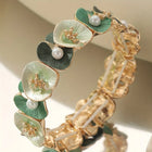 Bracelet vintage avec fleurs vertes et perles