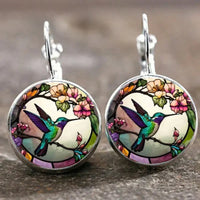 Collier avec Pendentif en Forme de Colibri avec Dôme en Verre