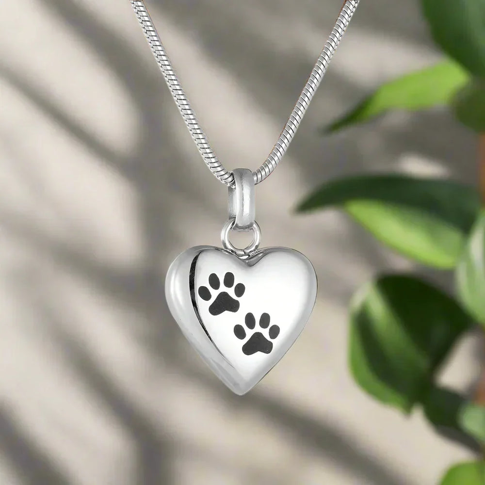 Collier avec urne commémorative pour animaux de compagnie – Pendentif en forme de cœur avec gravure d'une patte
