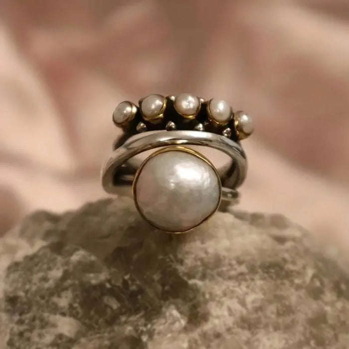 Bague vintage avec couronne en argent et perles