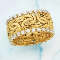 Bague avec bande en cristal tressé doré