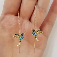Boucles d'oreilles rétro avec des oiseaux