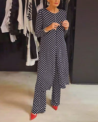 Costume élégant fendu à pois