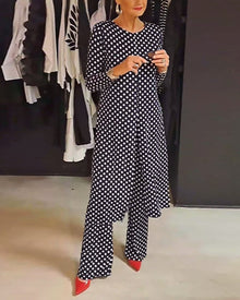 Costume élégant fendu à pois