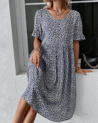 Robe élégante à col rond et imprimé floral