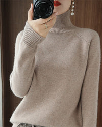 Pull simple à manches longues et col haut de couleur unie