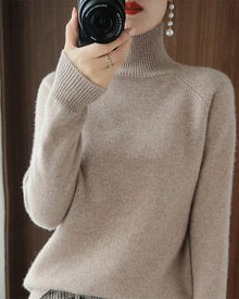Pull simple à manches longues et col haut de couleur unie