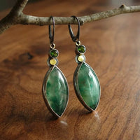 Boucles d'oreilles vintage avec pierre verte