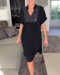 Robe ample plissée col V