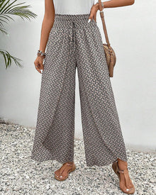 Pantalon large à cordon élastiqué à imprimé géométrique