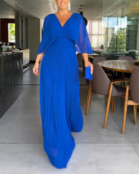 Robe à plis et taille cintrée