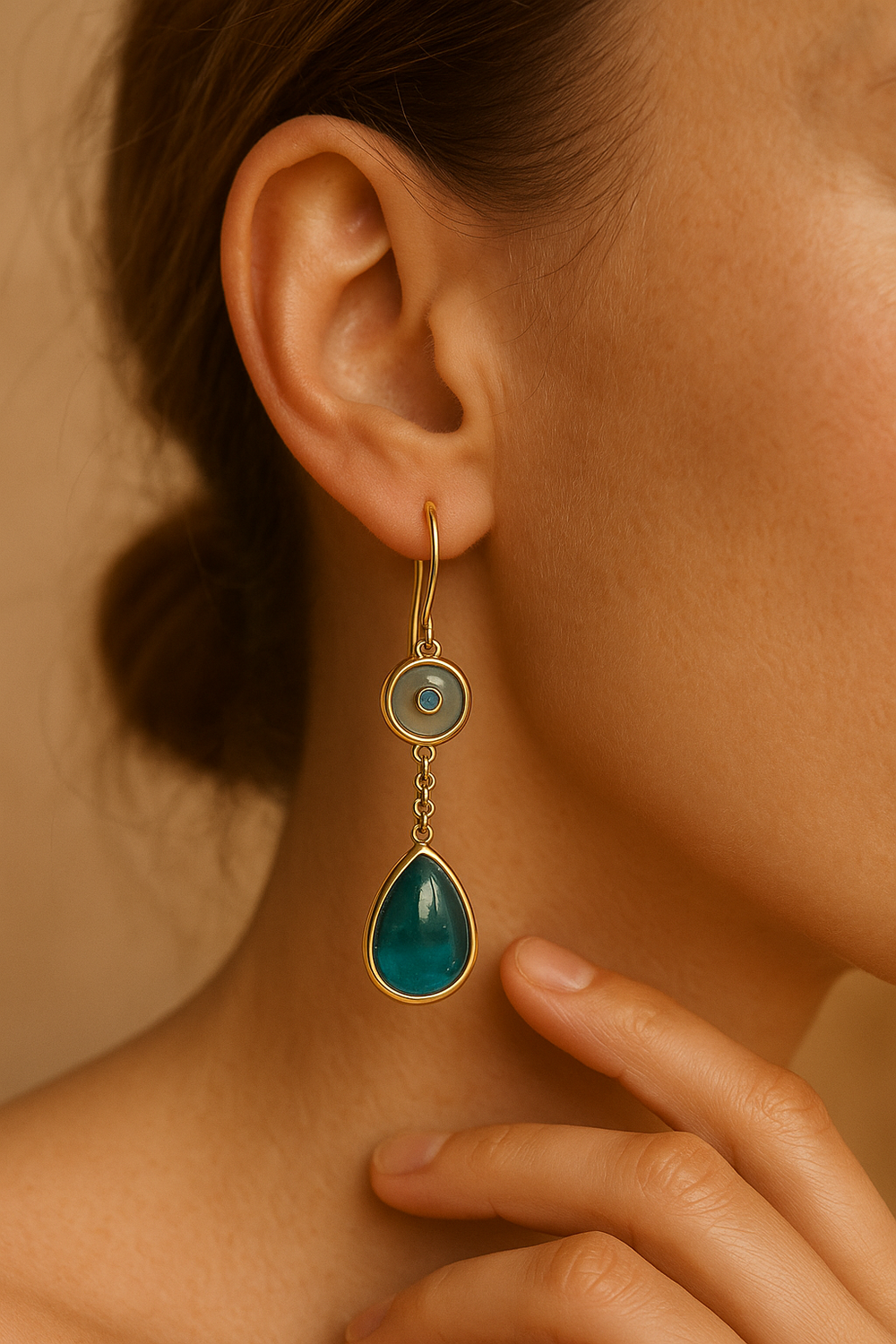 Boucles d'oreilles pendantes avec pierres bleues