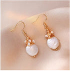 Boucles d'oreilles rétro avec perles d'eau douce en format spécial