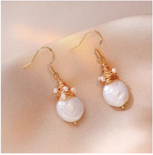 Boucles d'oreilles rétro avec perles d'eau douce en format spécial