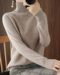 Pull simple à manches longues et col haut de couleur unie