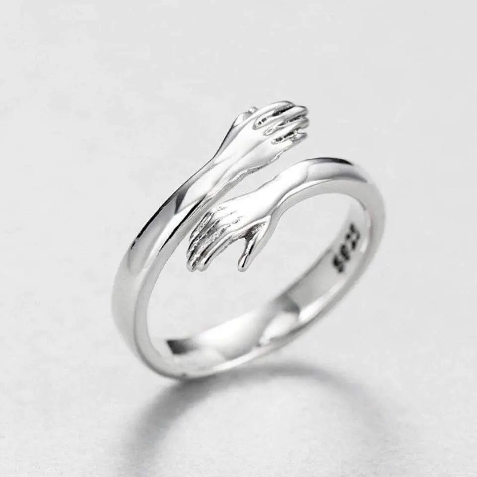 Bague ajustable type étreinte en argent