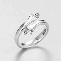 Bague ajustable type étreinte en argent