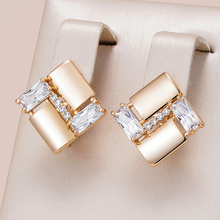 Boucles d'oreilles géométriques élégantes avec zirconia en or