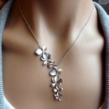 Collier vintage avec fleur en argent