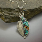 Collier en cristal avec feuille verte en argent vintage