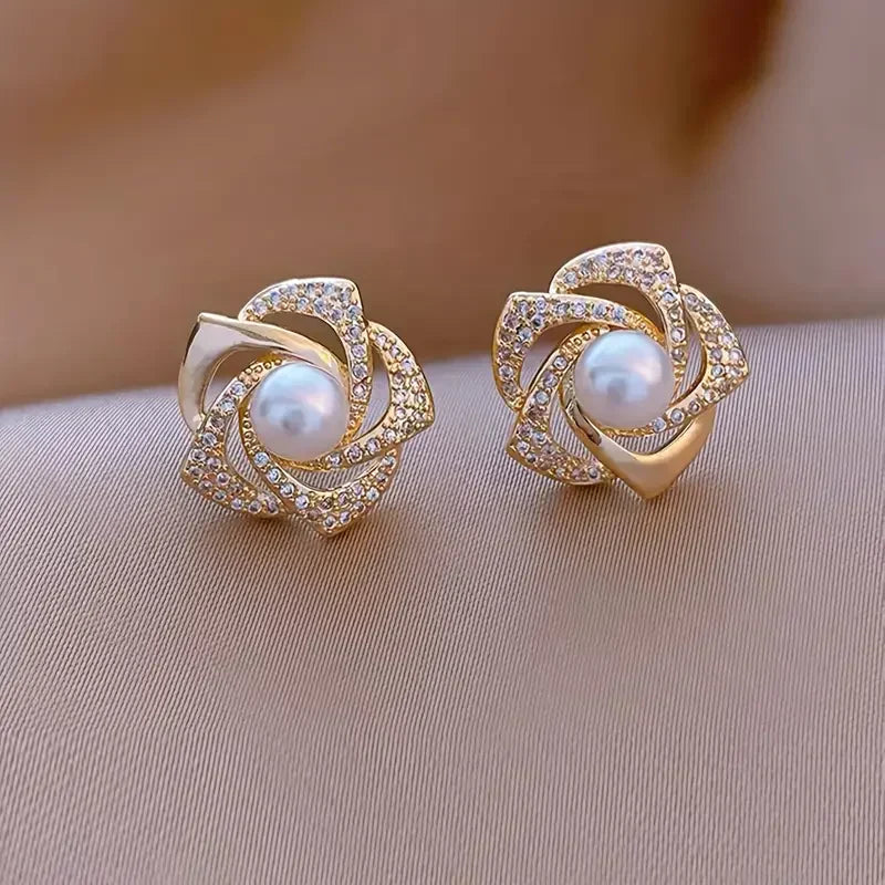 Boucles d'oreilles élégantes avec perles en spirale brillante
