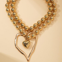 Ensemble de 2 colliers avec des perles en forme de cœur
