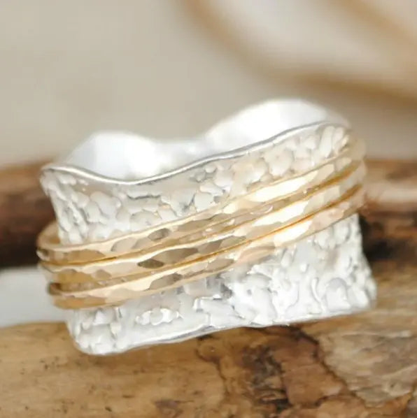 Bague vintage fine tournante en doré et argenté