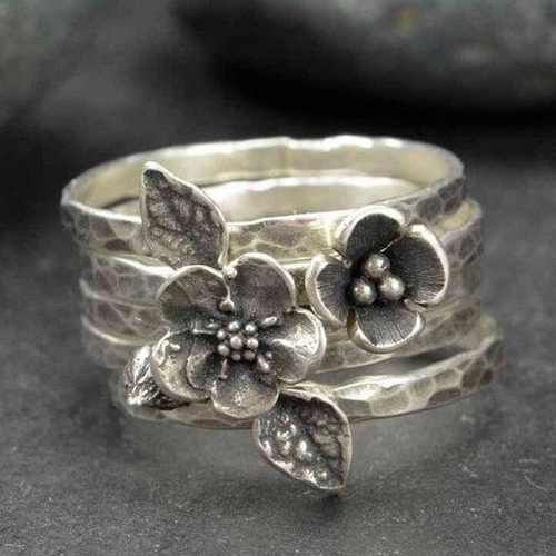 Bague vintage avec couches et fleur en argent