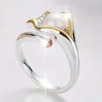 Bague vintage en or et argent avec perles