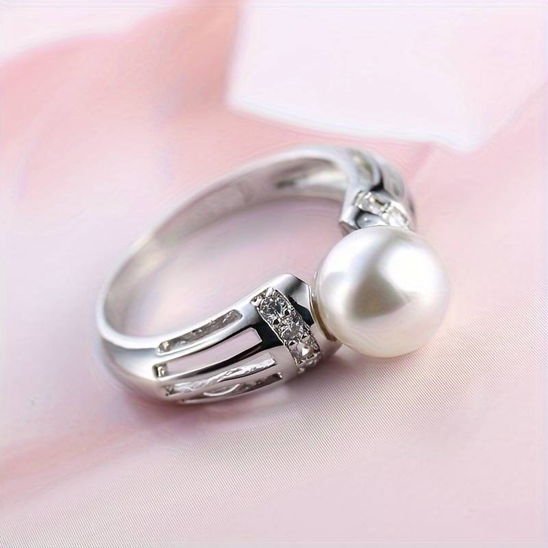 Bague vintage avec perle argentée