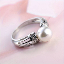 Bague vintage avec perle argentée