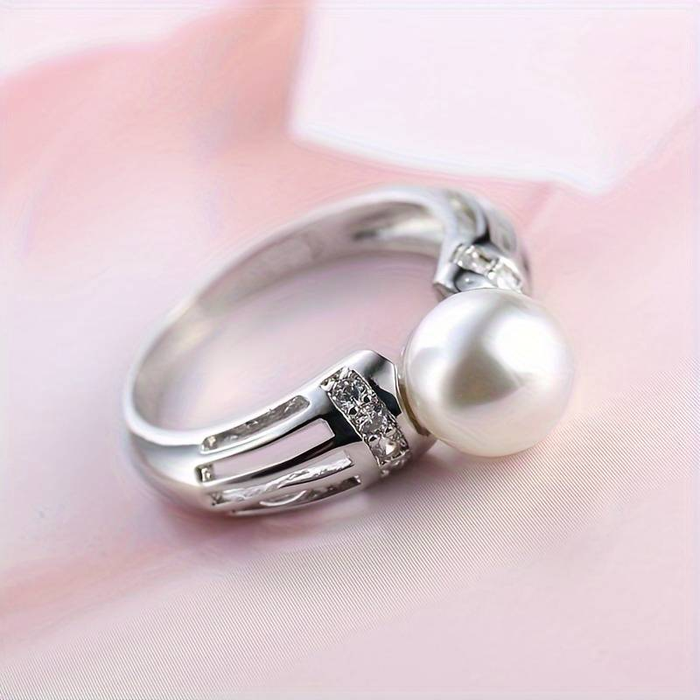 Bague vintage avec perle argentée