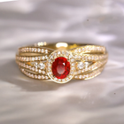 Bague Dorée en Couches avec Brillant Rouge