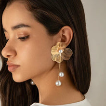 Boucles d'oreilles bohémiennes avec perles et pétales