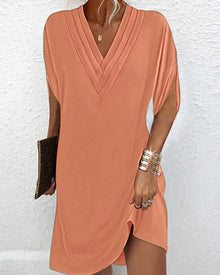 Robe élégante à manches fendues de couleur unie
