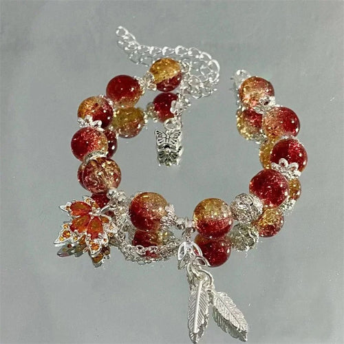 Bracelet avec feuille d'automne argentée et papillon