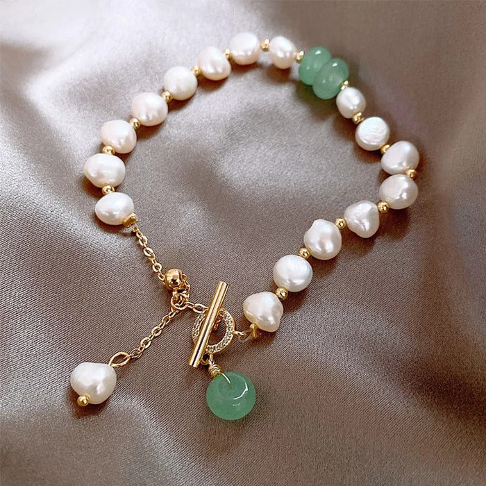 Bracelet vintage avec perles et pierres précieuses vertes dorées