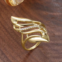 Bague vintage en or avec feuille torsadée