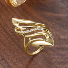 Bague vintage en or avec feuille torsadée