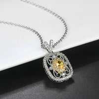 Collier rétro avec pierres précieuses jaunes et cristaux argentés