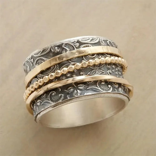 Bague rotative au design baroque vintage