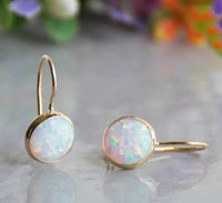 Boucles d'oreilles vintage en or avec pierre d'opale